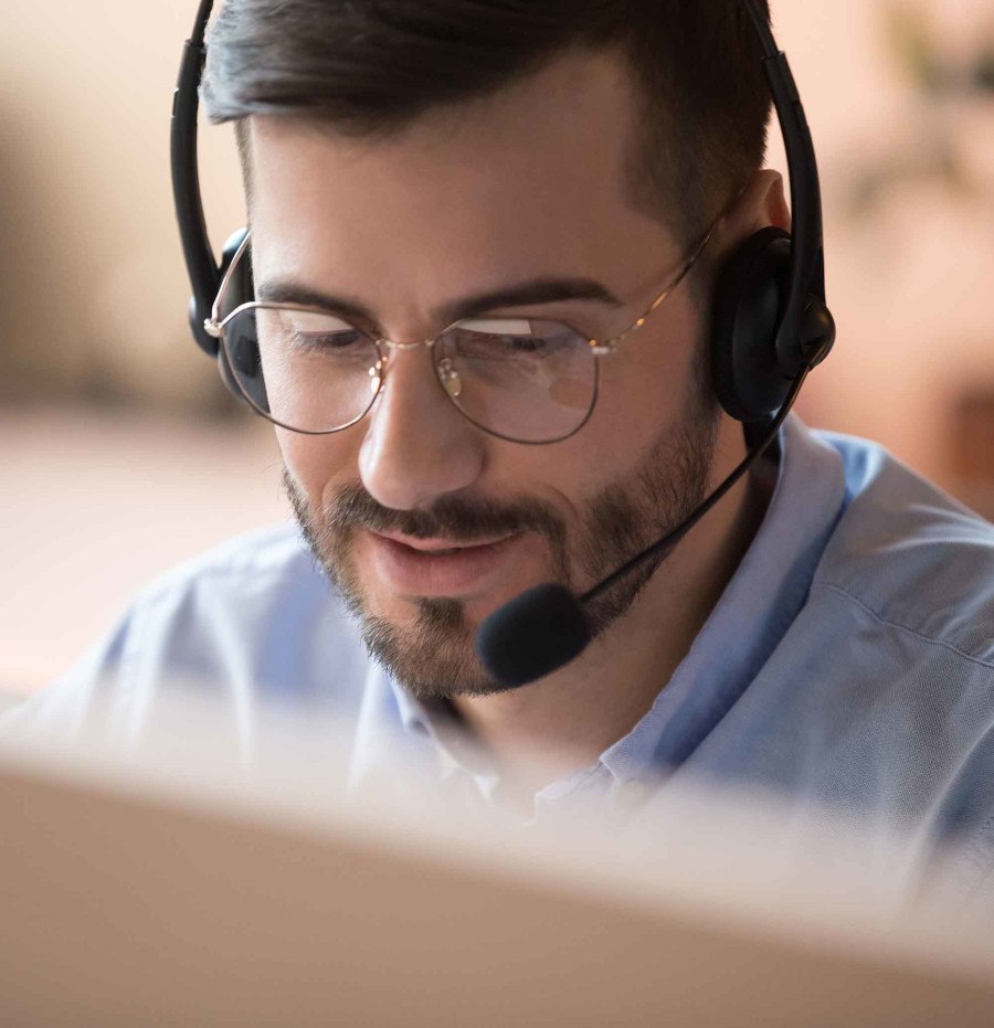 man on headset talking to customer