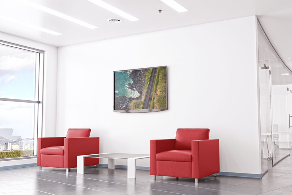 Two red chairs in a lobby