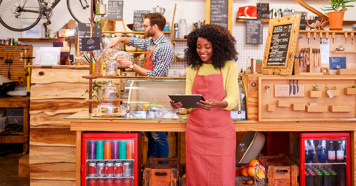 Businesswoman in a store looking at a tablet