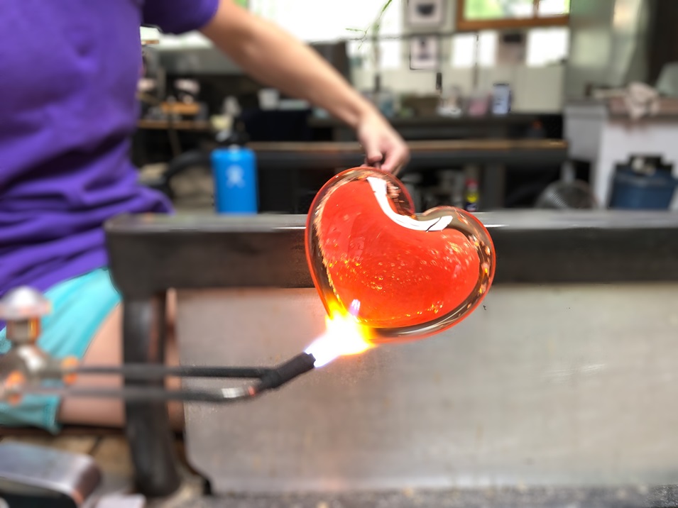 Person making glass art