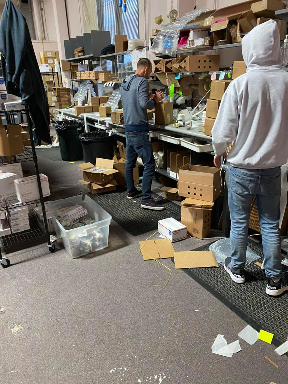 Workers packing boxes for shipment