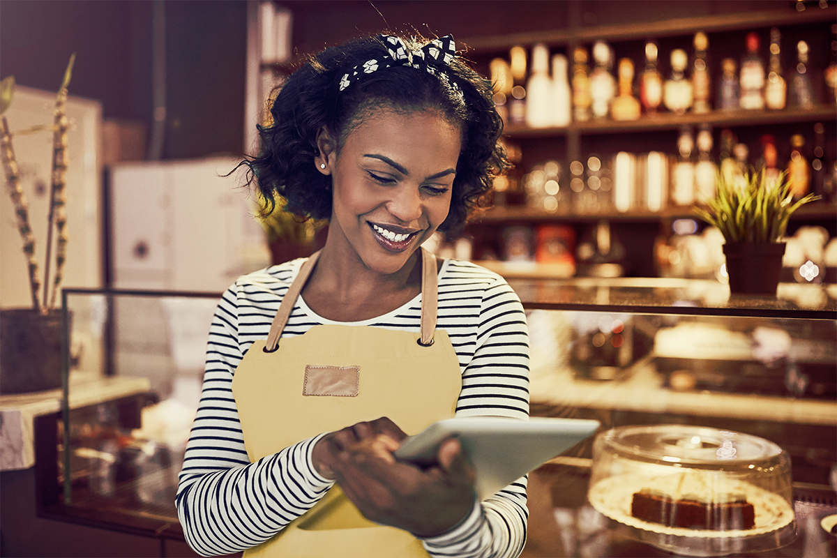 A woman working on a tablet