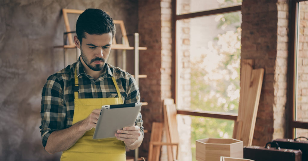 A man holding a tablet