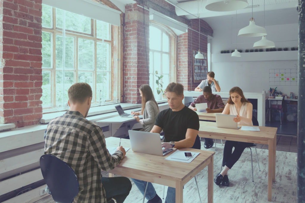 People working in a co-working space