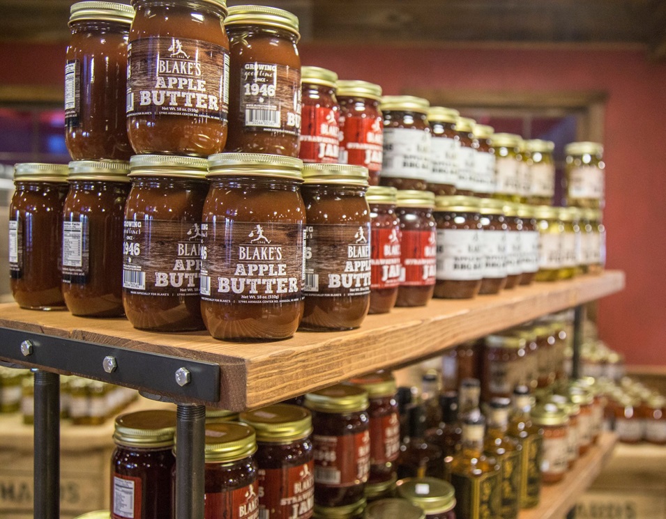 Jars of apple butter on a shelf