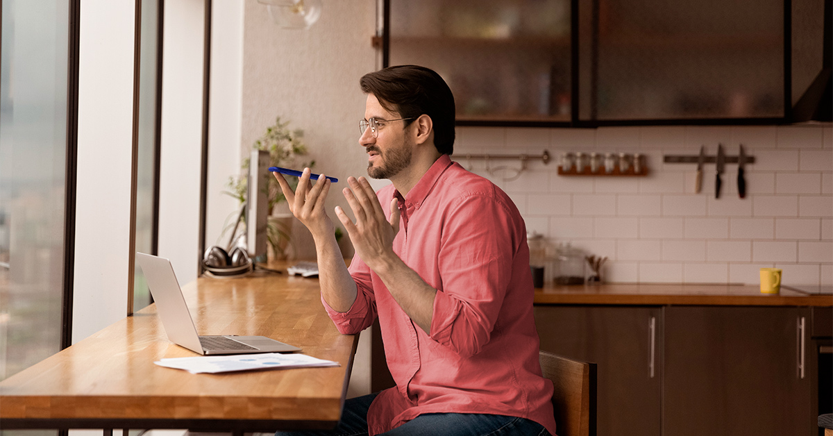 Man working form home talking on a cell phone