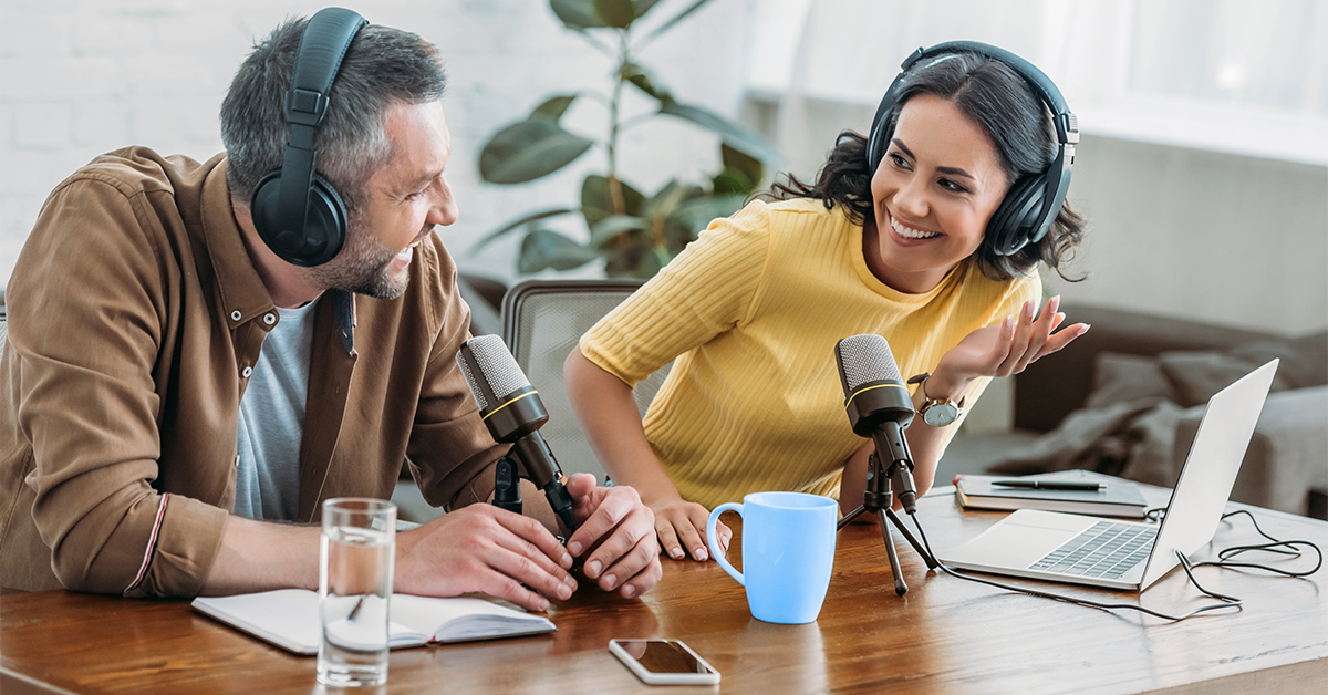 Two people having a discussion during a podcast