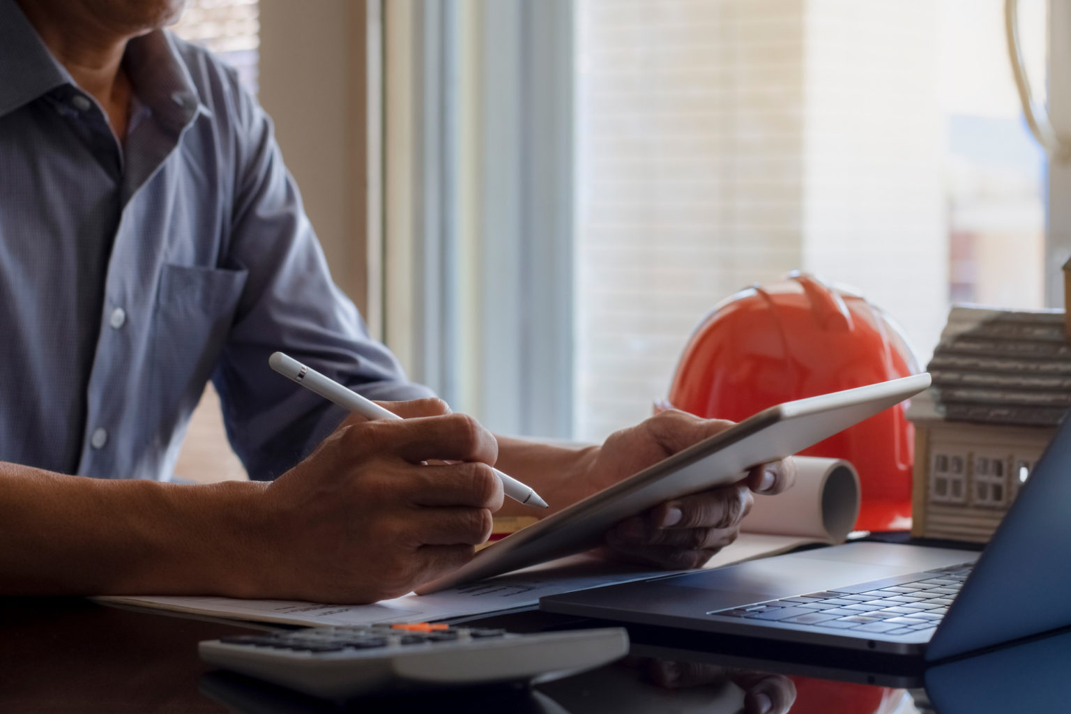 A person working on a tablet